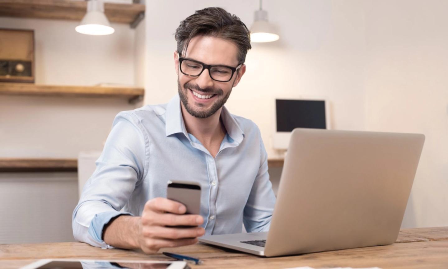 Manager reviewing interactive learning module on tablet